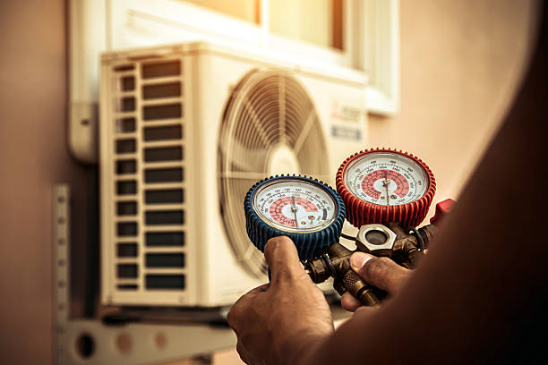 Professional Hvac technician working in Logan, NM